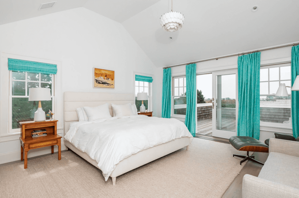 bedroom with aqua curtains